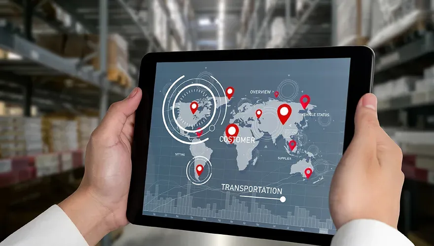 Control-tower operator monitoring live freight movements on screen